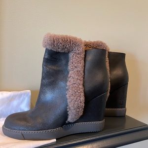 Chloe - See by Chloe boots.  Super cute black with fur.